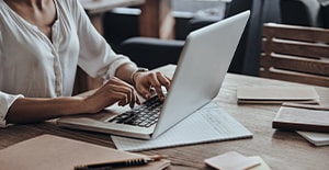 person using laptop for work